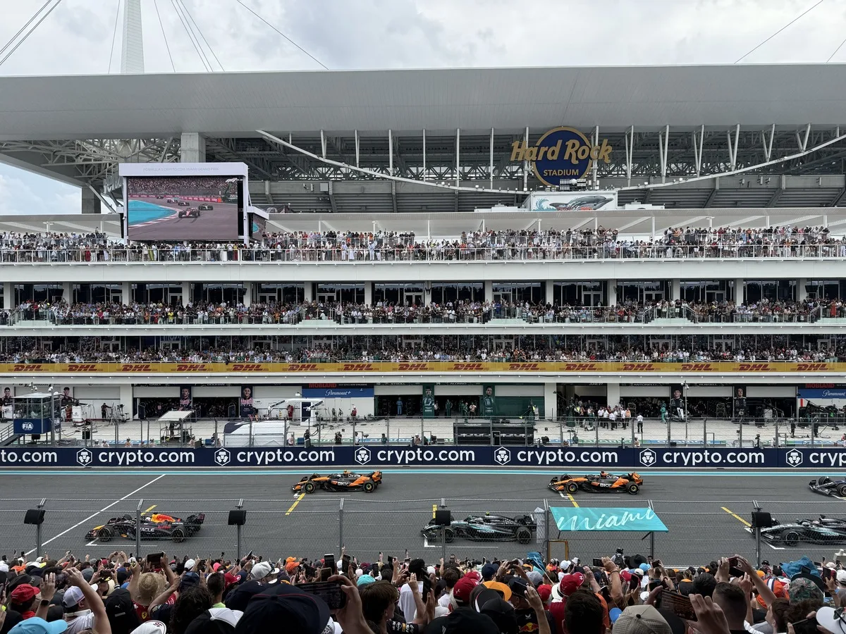 Mercedes F1 car at the Miami International Autodrome, teal painted run-off visible