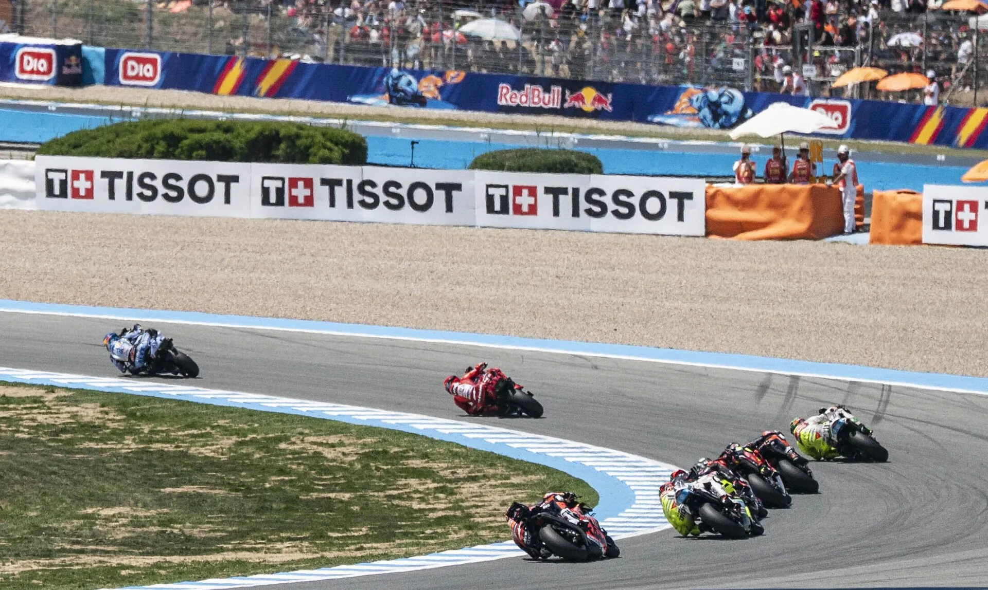 A MotoGP pack sweeps through Circuito de Jerez during the Spanish motorcycle Grand Prix