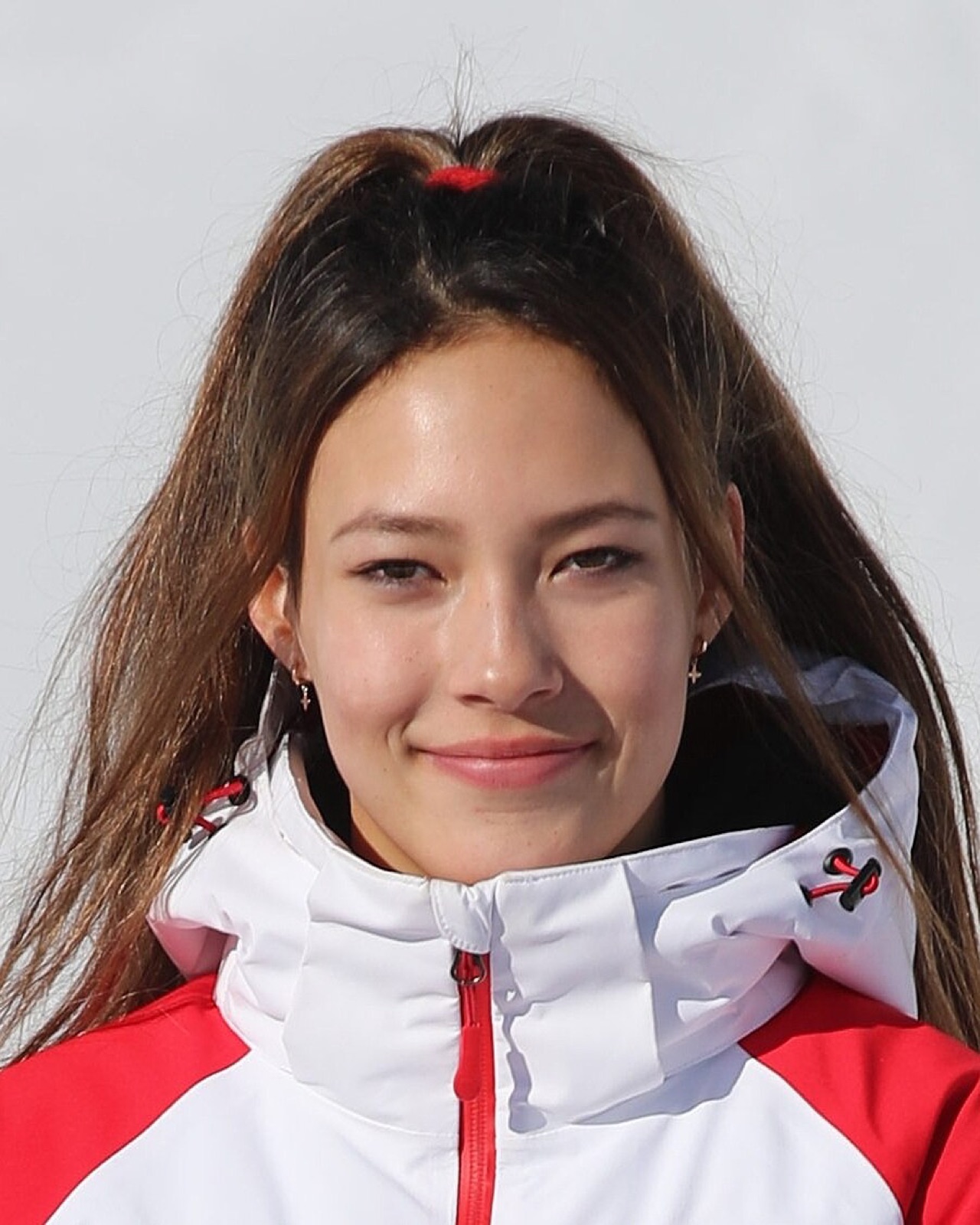 Freestyle skier launching off a jump in aerial competition
